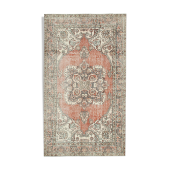 Turkish hand-knotted distressed 1970s beige carpet 178 cm x 305 cm