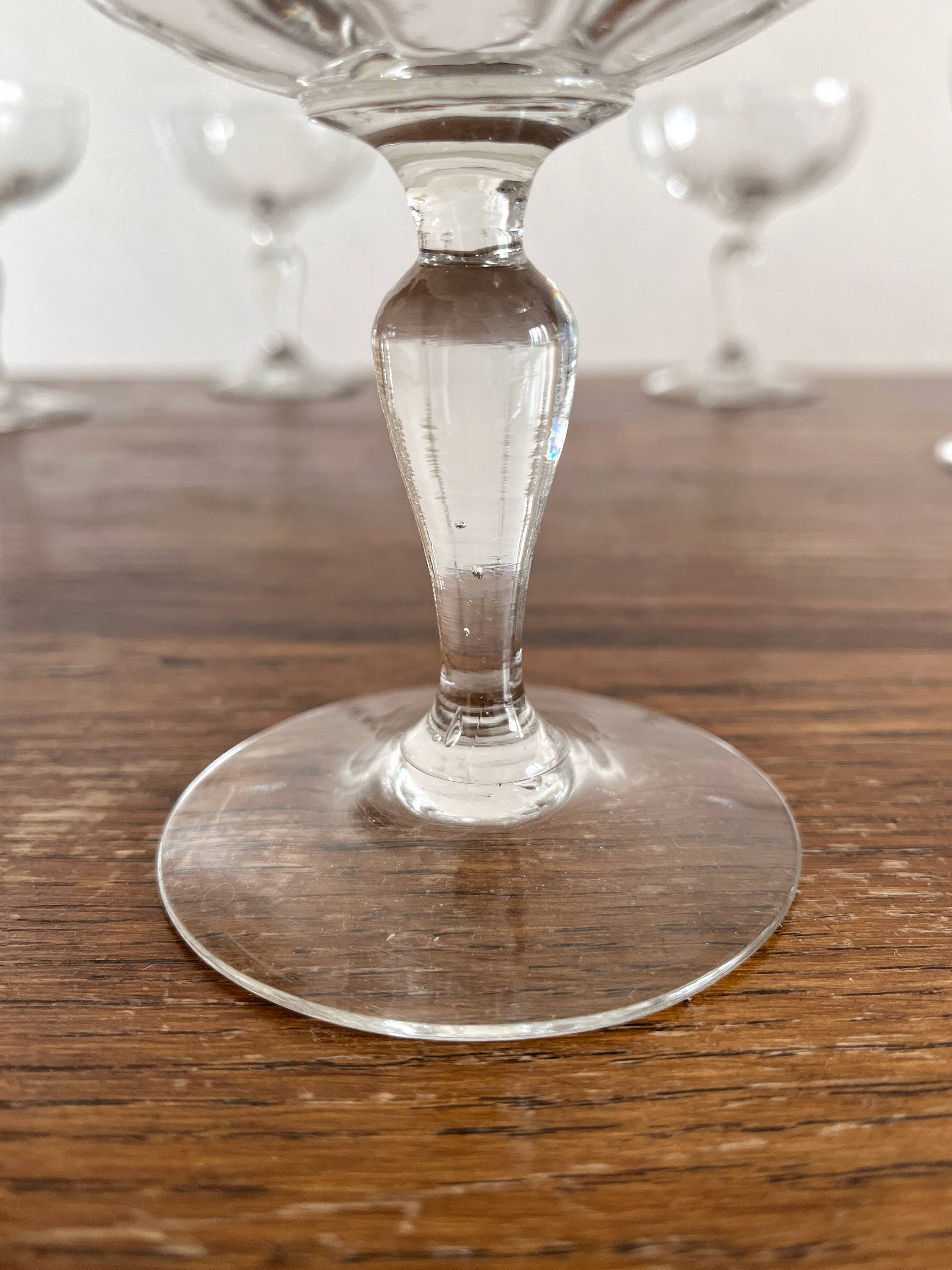10 antique champagne glasses in blown glass, 19th century