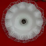 White opaline suspension with toothed edges