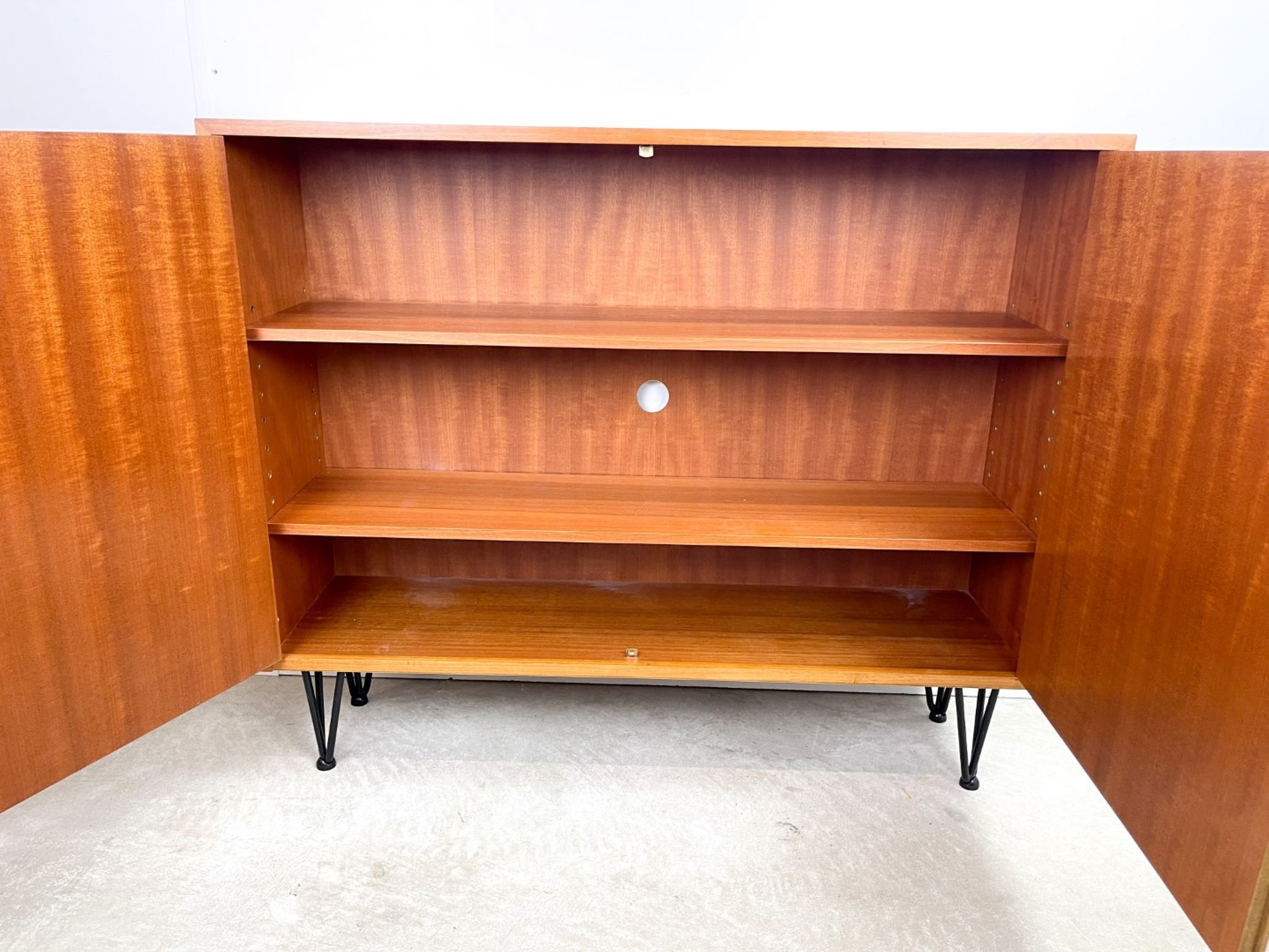 High vintage cabinet with hairpin legs