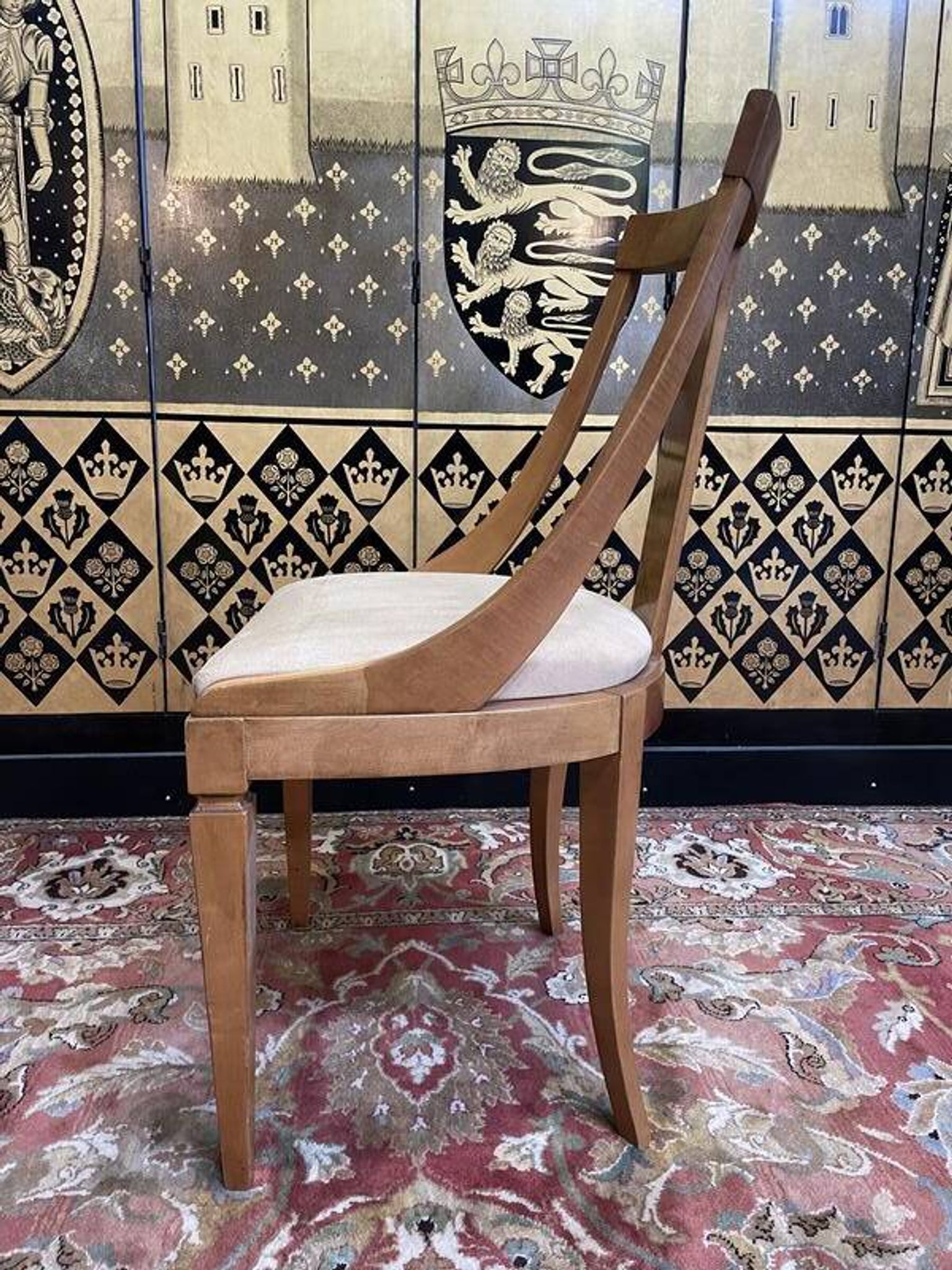 Suite de 6 chaises gondoles de style Empire
