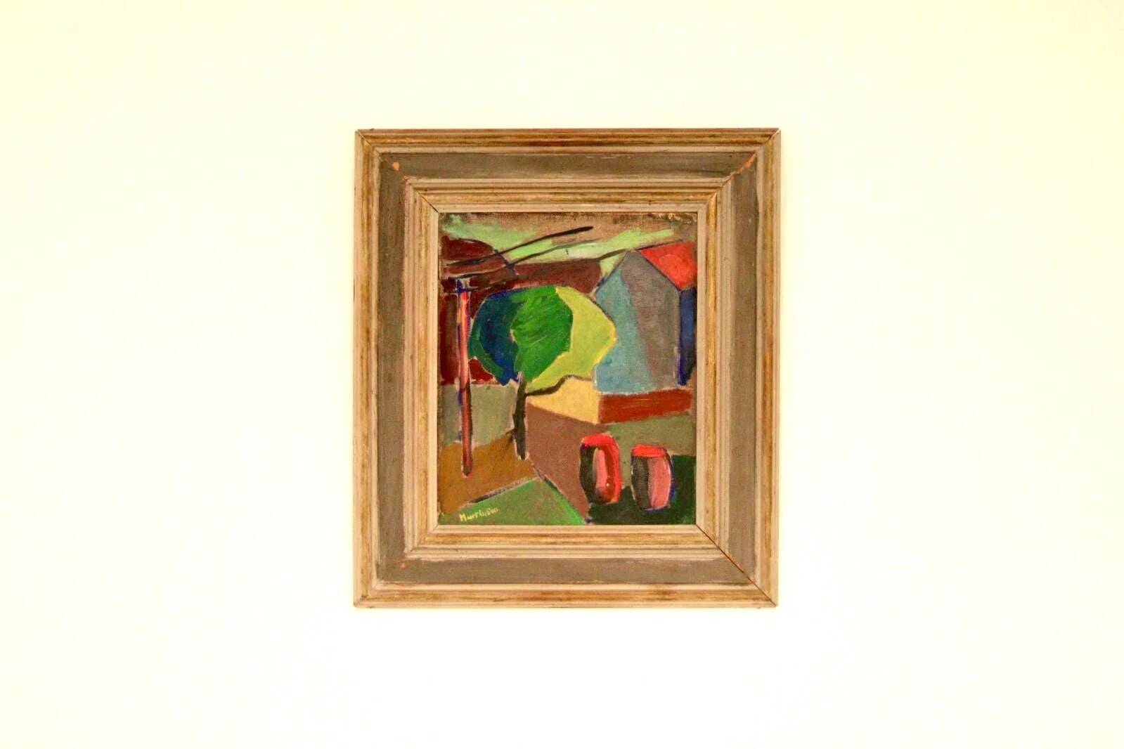 House obscured by a tree by Harry Martinson