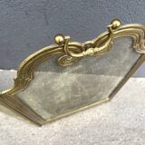 Antique brass fireplace screen from 1920, vintage spark guard.