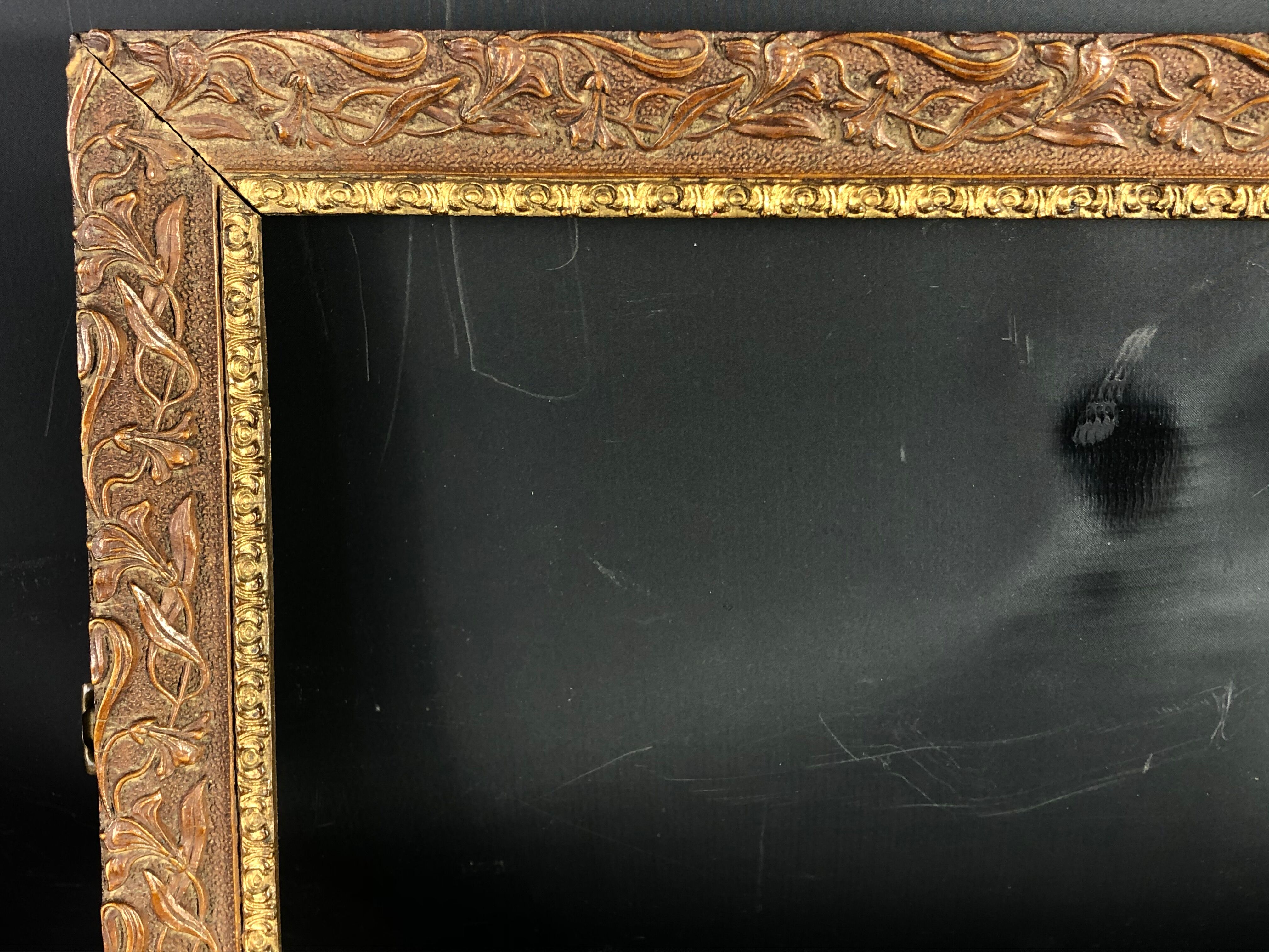 Old frame wood and stucco patinated and gilded