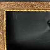 Old frame wood and stucco patinated and gilded