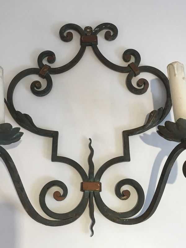 Pair of large decorative wrought iron wall sconces