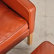 Armchair 2204 and leather pouf by Børge Mogensen, Denmark, 1960s.