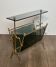 Brass magazine rack and blue-tinted glasses