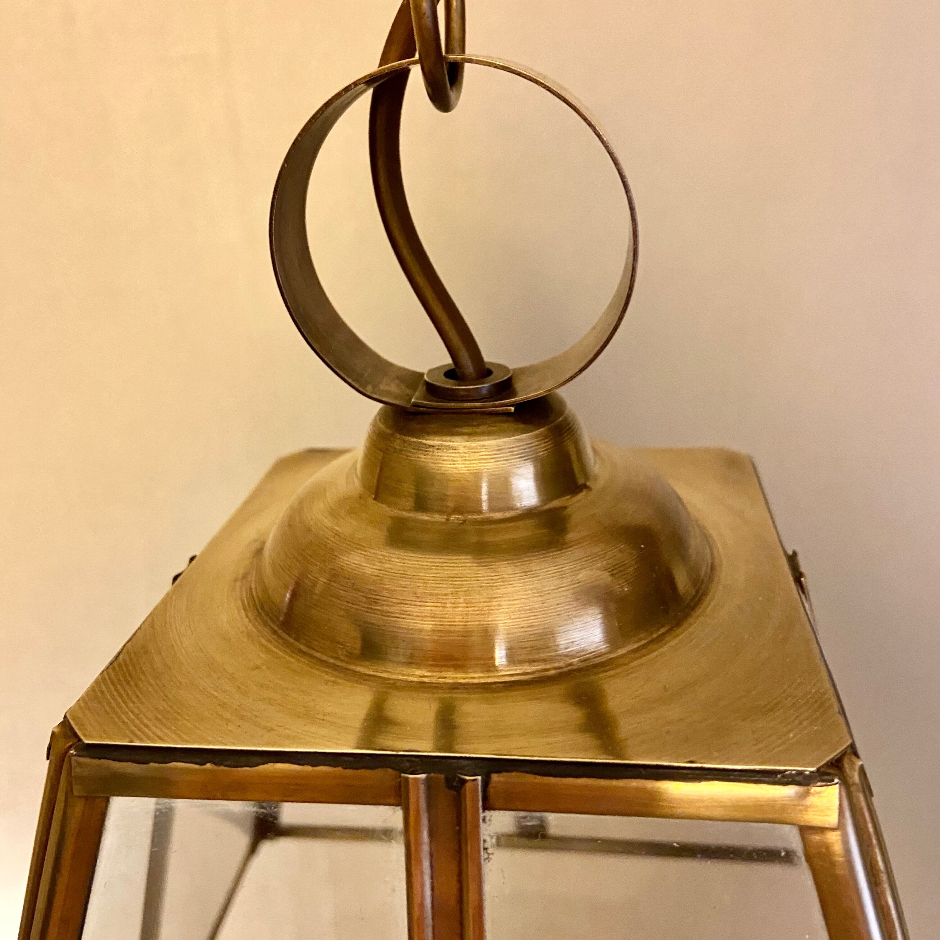 Glass and brass suspension