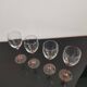 4 Luminarc white wine glasses with pink feet