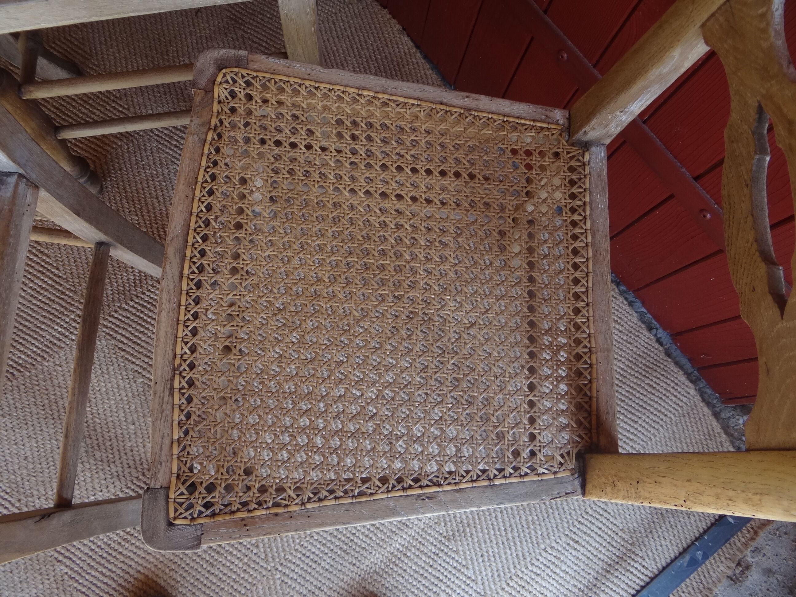 Suite of oak chairs; canated seats