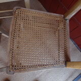 Suite of oak chairs; canated seats