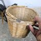 Small front bicycle basket in wicker.