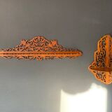 Old wall corner shelf in cut wood from the 1900s