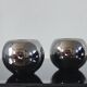 Paire de bougeoirs / photophores boules en céramique argentée effet mi