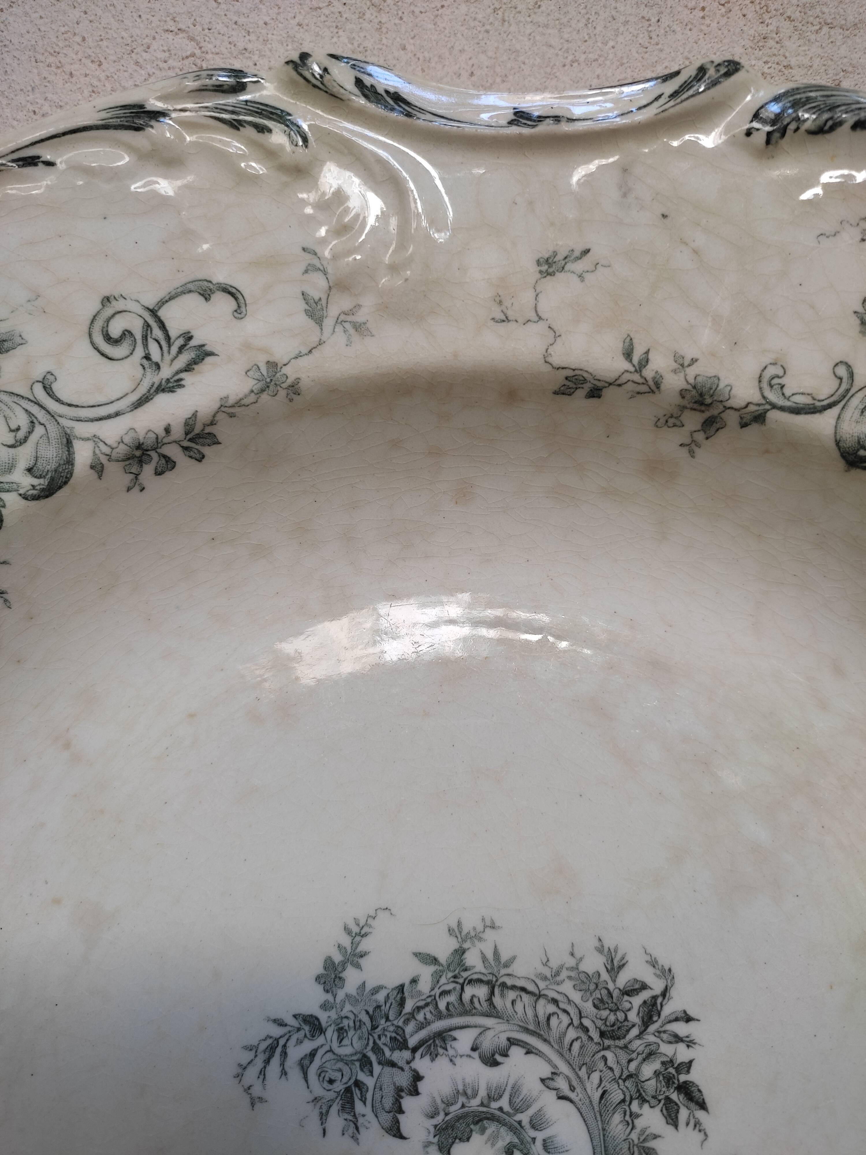 Hollow earthenware dish by Gien