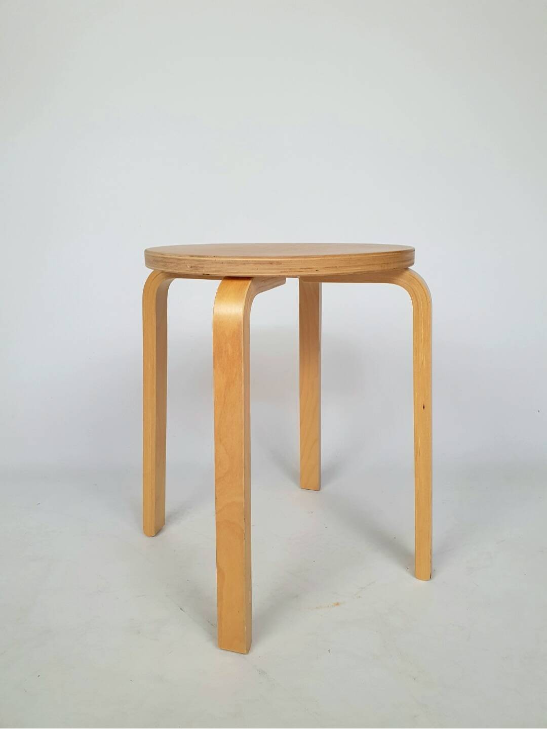 Pair of vintage Ikea "Frosta" curved wooden stools