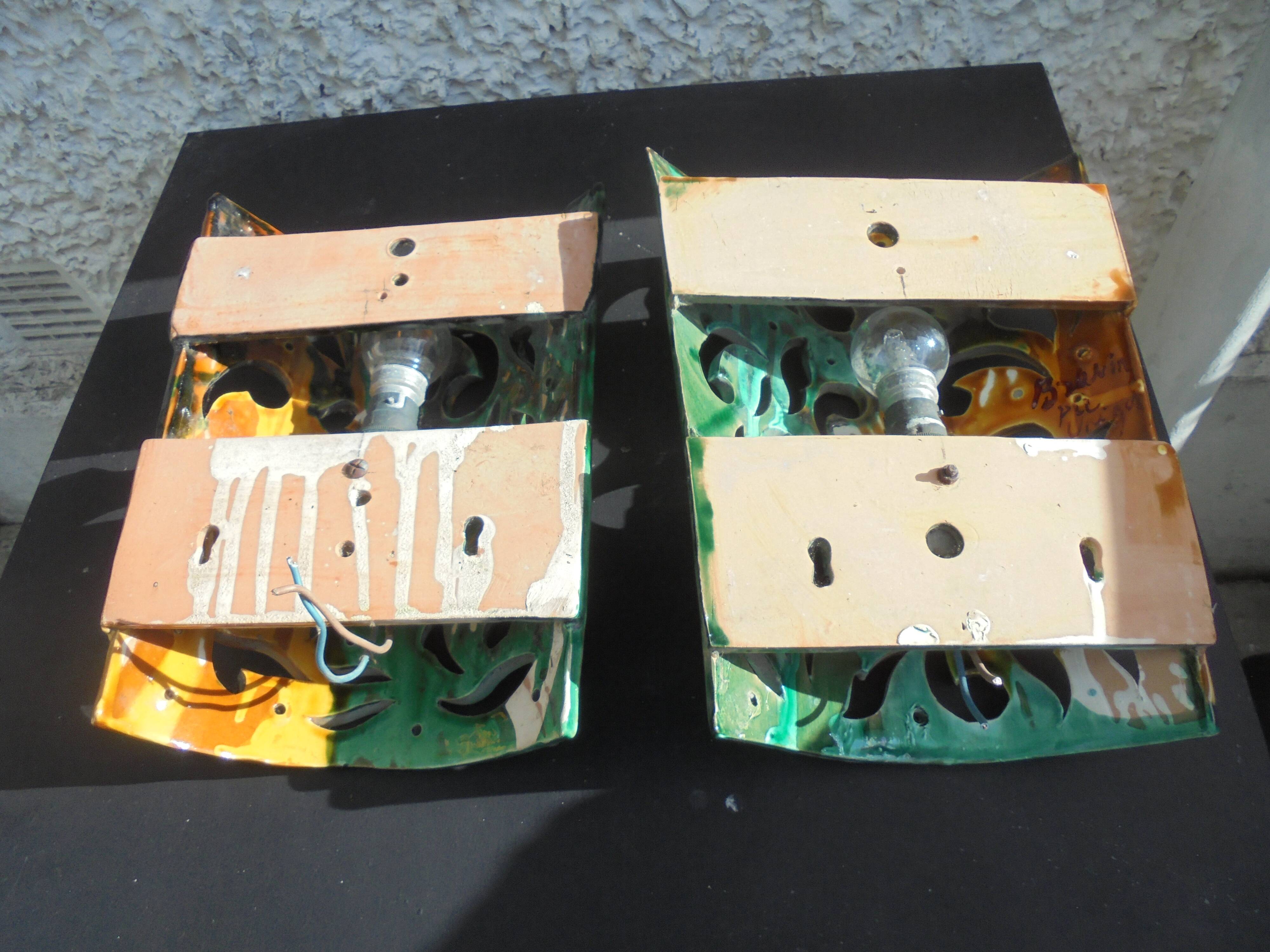 Pair of ceramic wall lights in Vallauris style, Brunin.