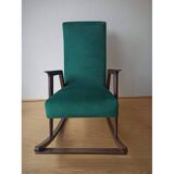 Fauteuil à bascule vintage des années 50.