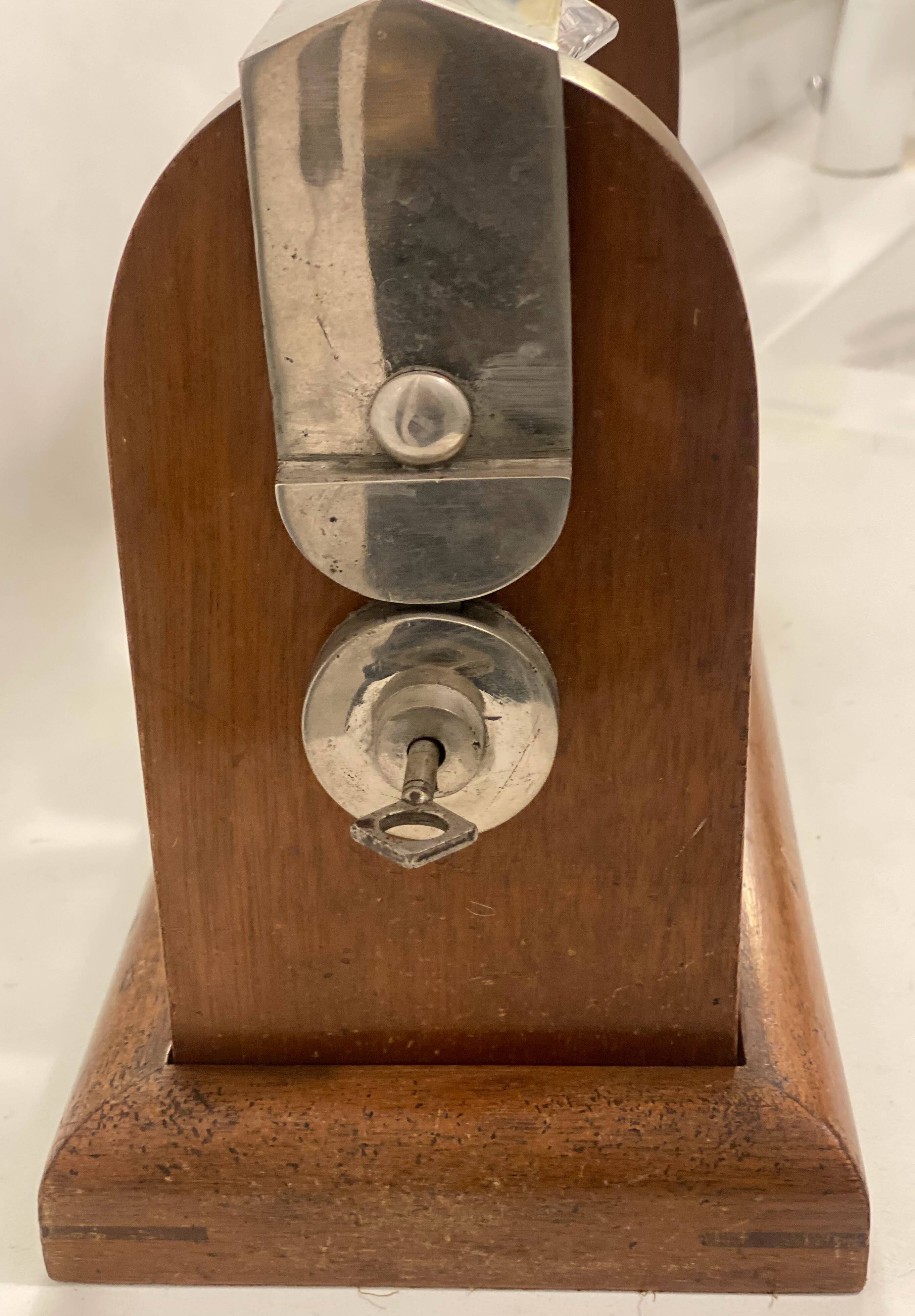 Portable Art Deco liquor cabinet in mahogany & metal with 3 Baccarat crystal bottles.