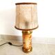 Old ceramic lamp "Lunéville" with a pig bladder shade.