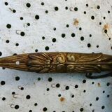 Art Nouveau wall light in bronze with a white Haviland porcelain shade.