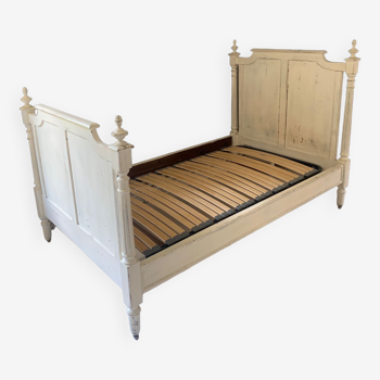 White painted wooden bed