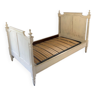White painted wooden bed