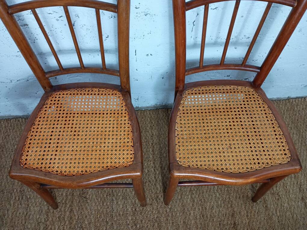 pair of caned bistro chairs from the 1930s