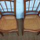 pair of caned bistro chairs from the 1930s