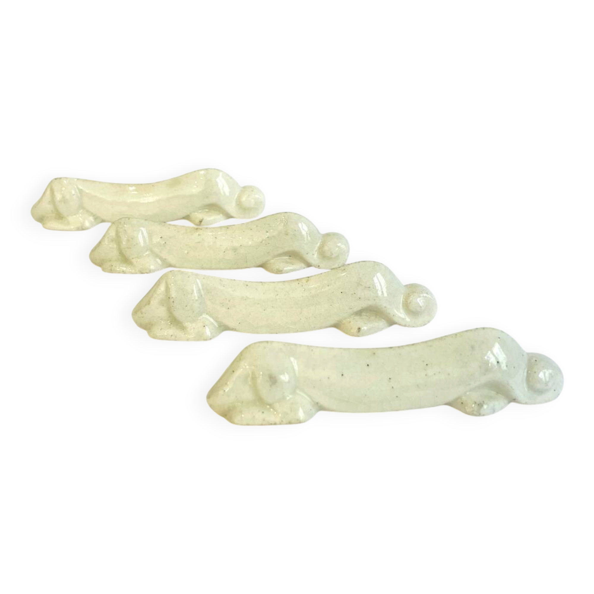 Set of 4 Art Deco knife rests, Primavera workshop