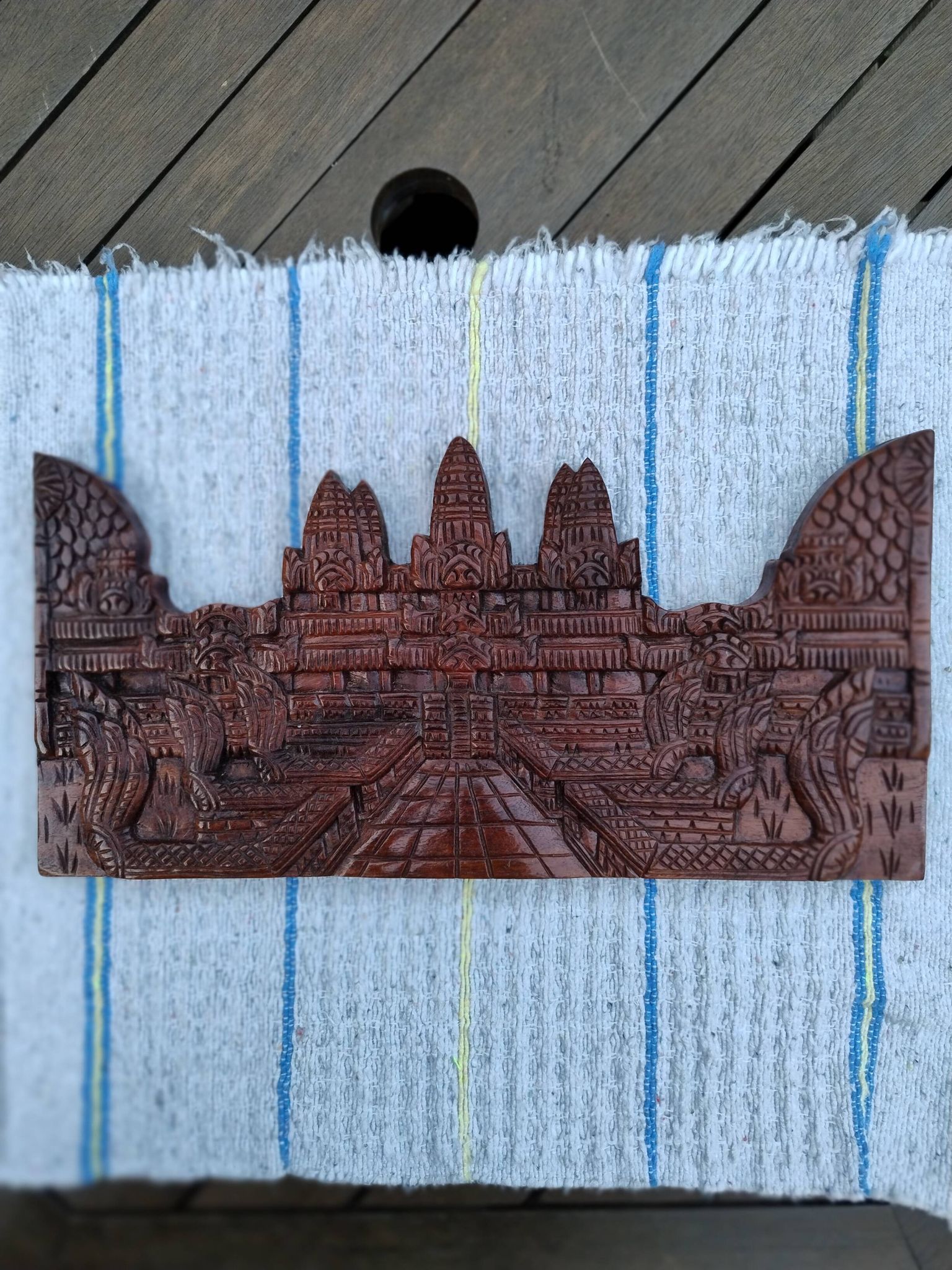 Carved wooden relief, reproduction of the Angkor Wat temple.