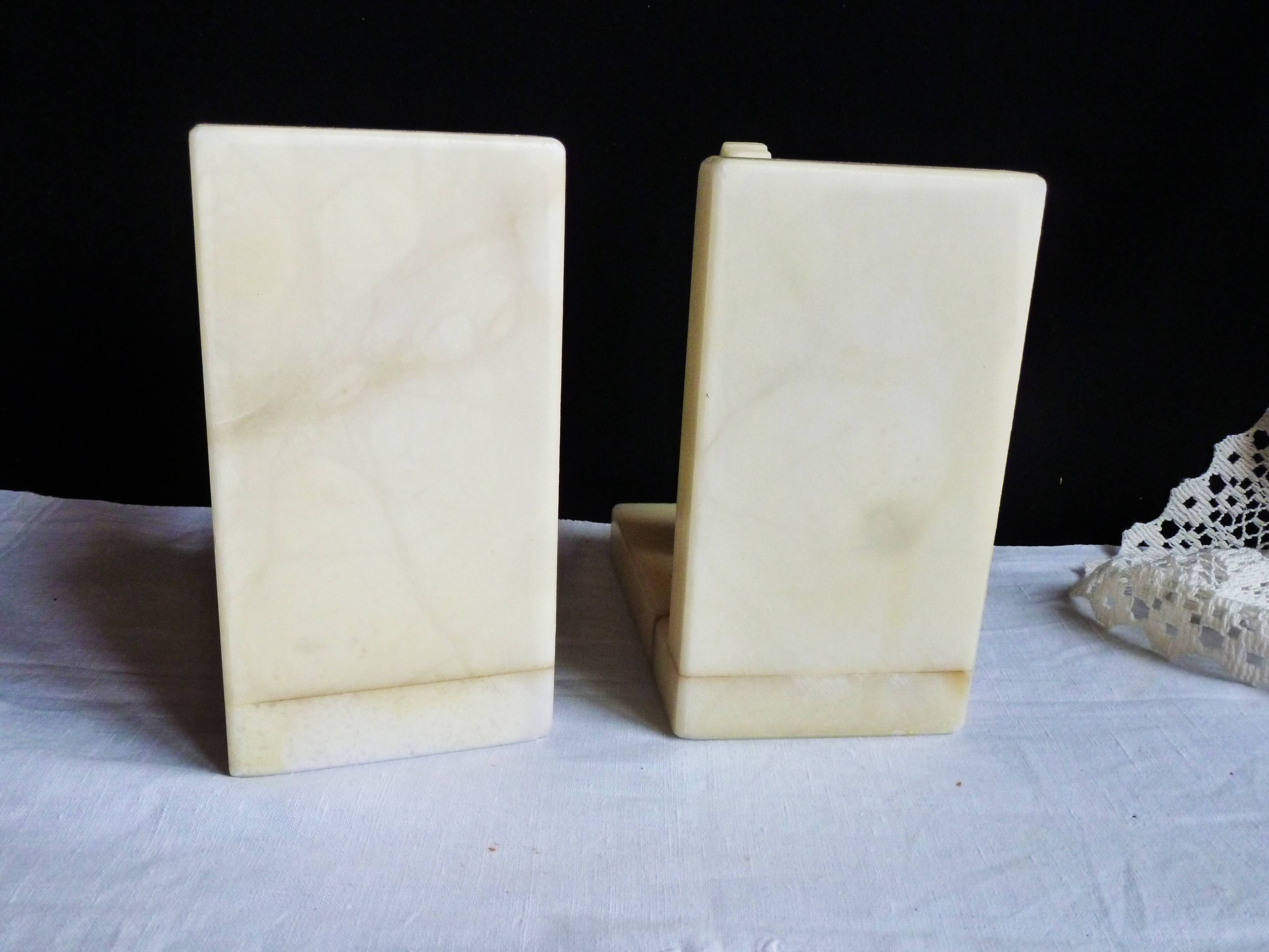 Elephant bookends in alabaster, Pair of elephant bookends.