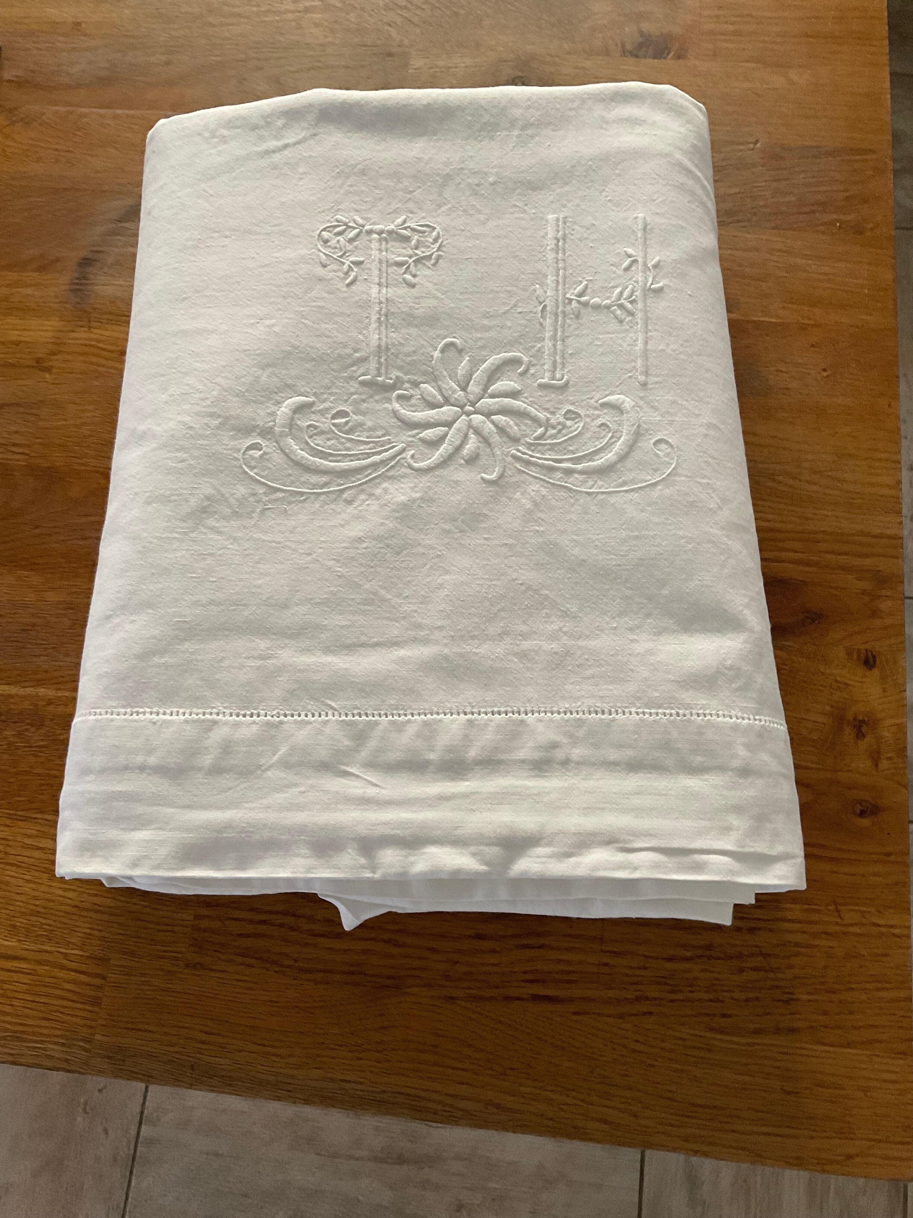 Linen/cotton embroidered sheet.  Monogram TH