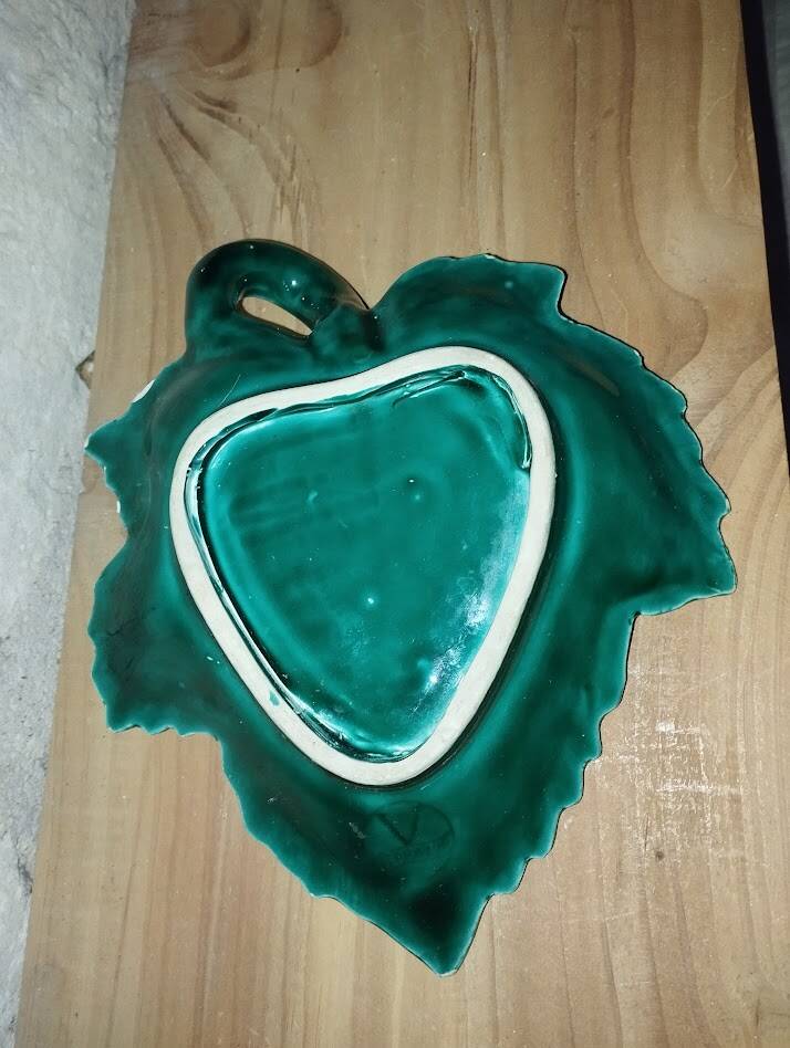 Charming ceramic dish in the shape of a leaf, signed Vallauris, in