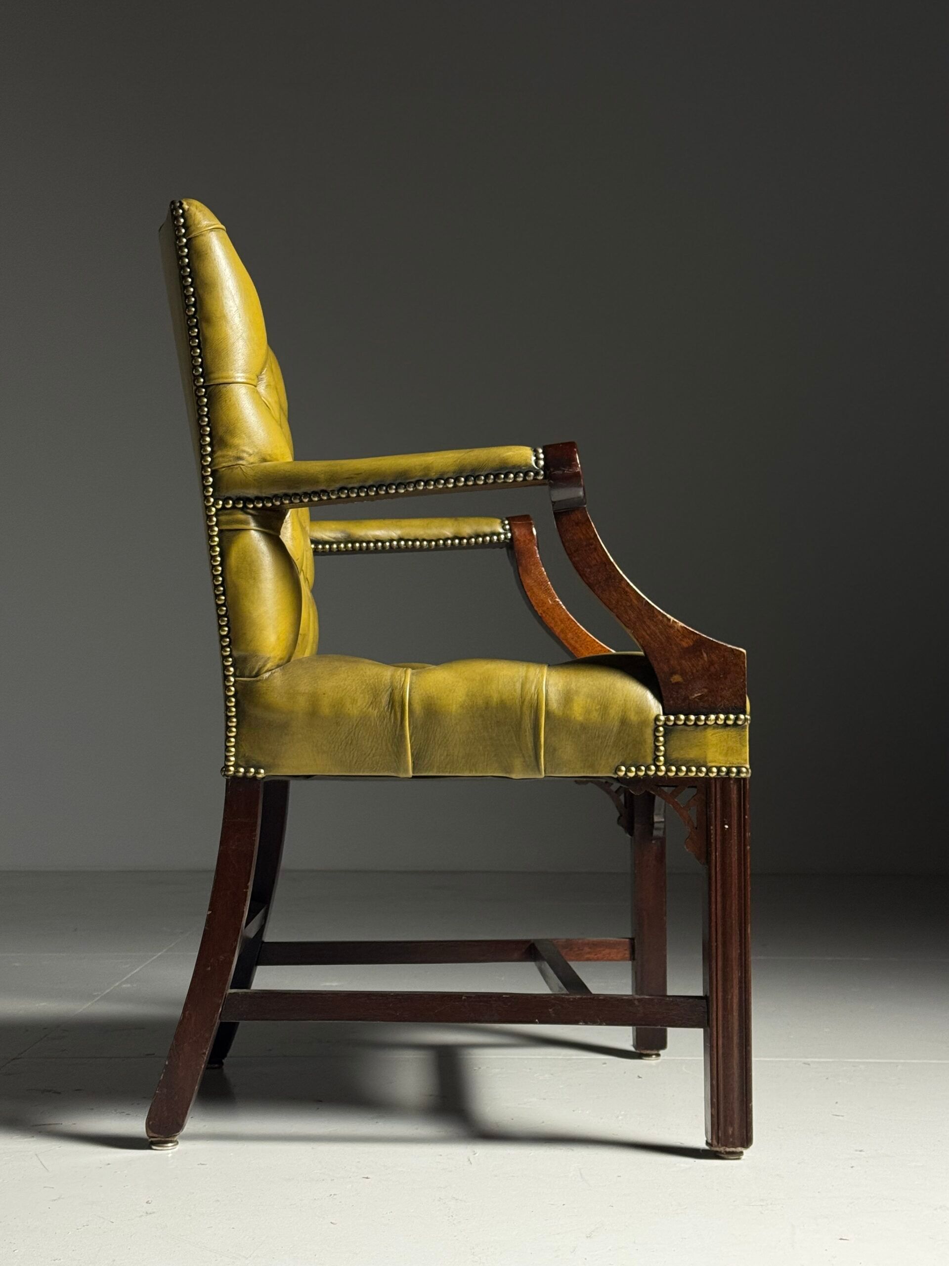 Green leather tufted office chair