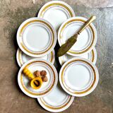 8 assiettes à dessert St Amand en faïence jaune et dorée