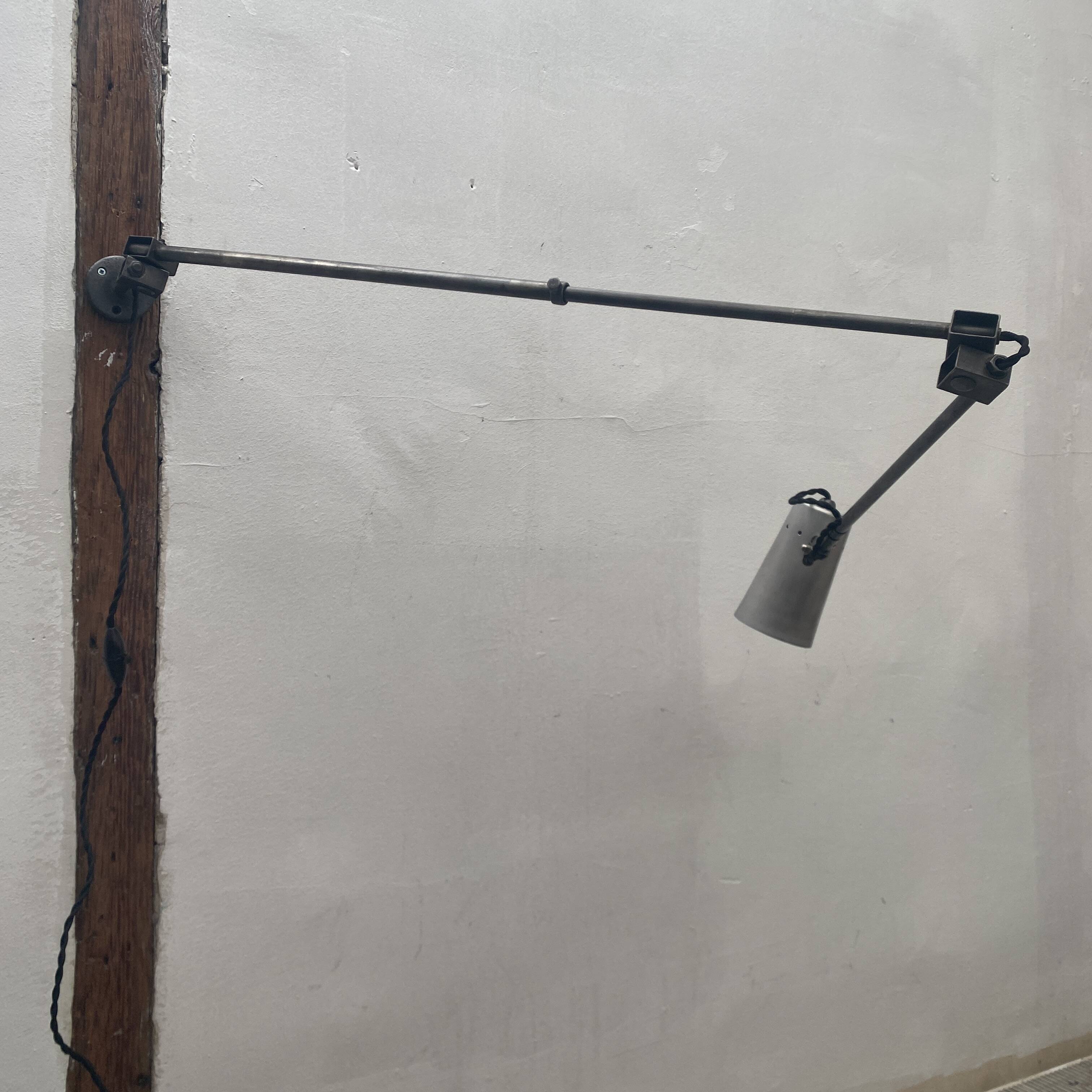 Vintage industrial workshop wall light from the 1950s.