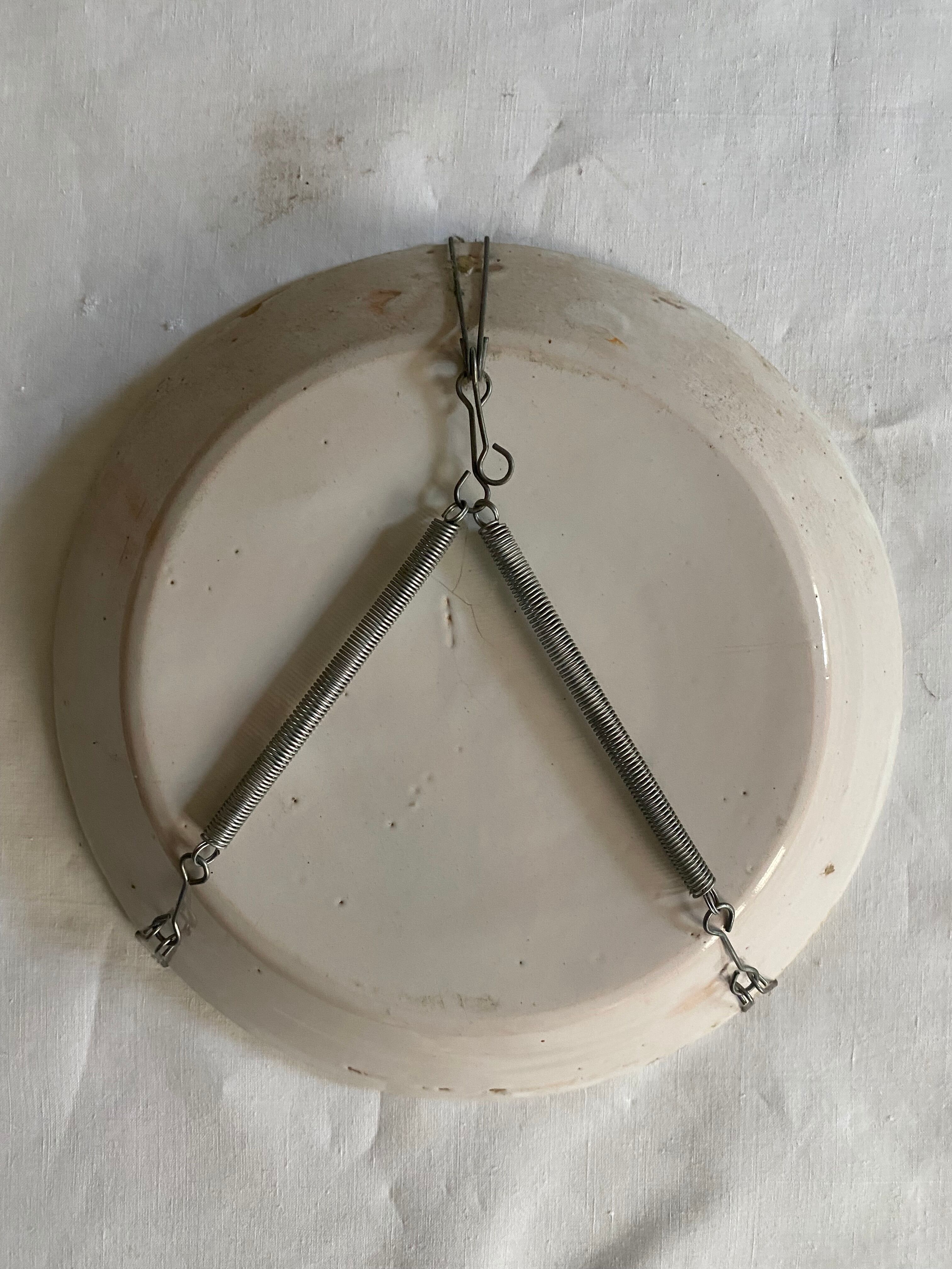 Plate of Nevers in earthenware late eighteenth century decoration of cornucopia