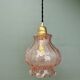 Suspension globe vintage en verre granité rose
