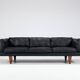 Illum Wikkelso model V11 sofa in black leather by Holger Christiansen, Denmark, 1960