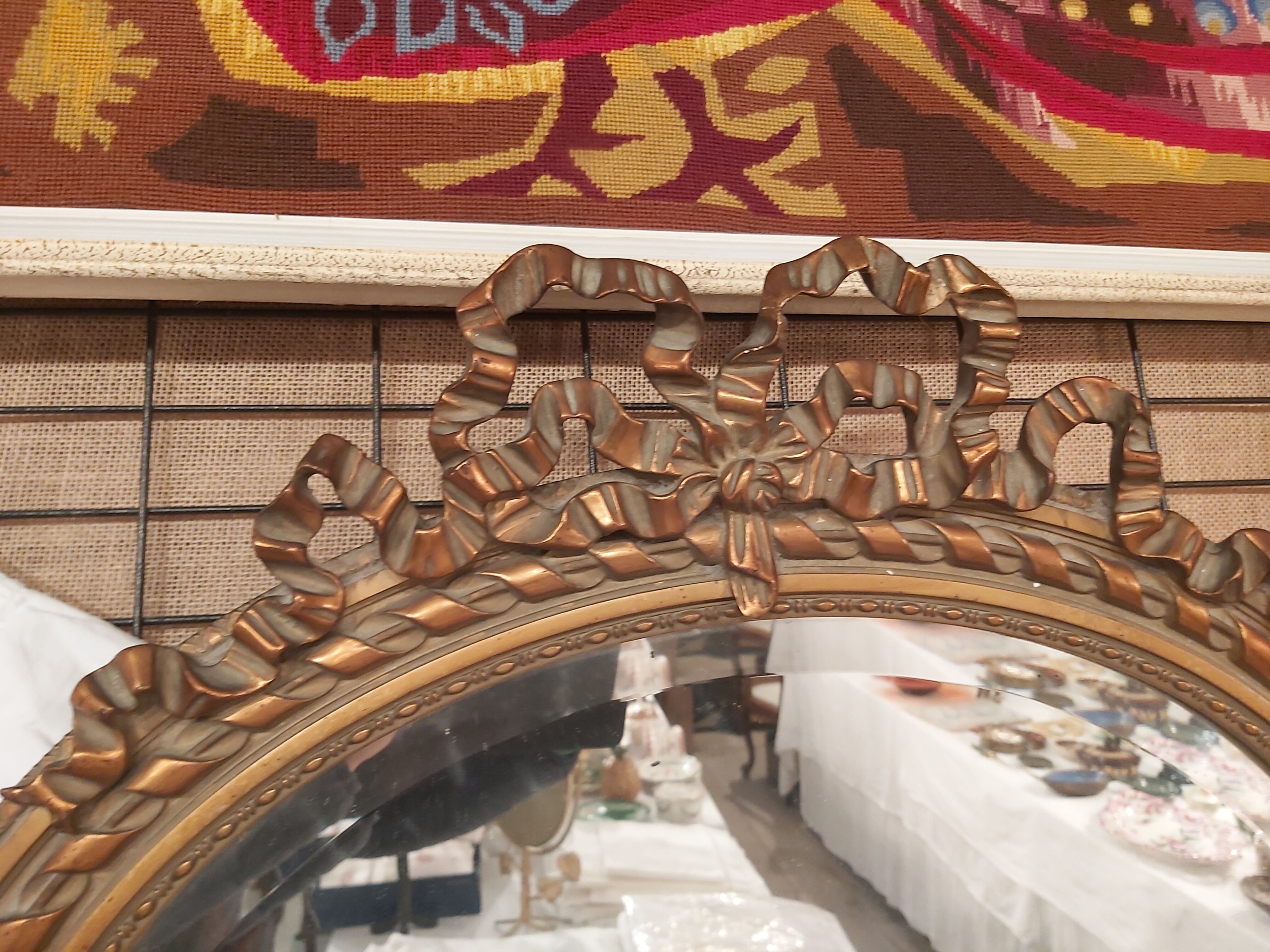 Louis XVI style oval beveled mirror