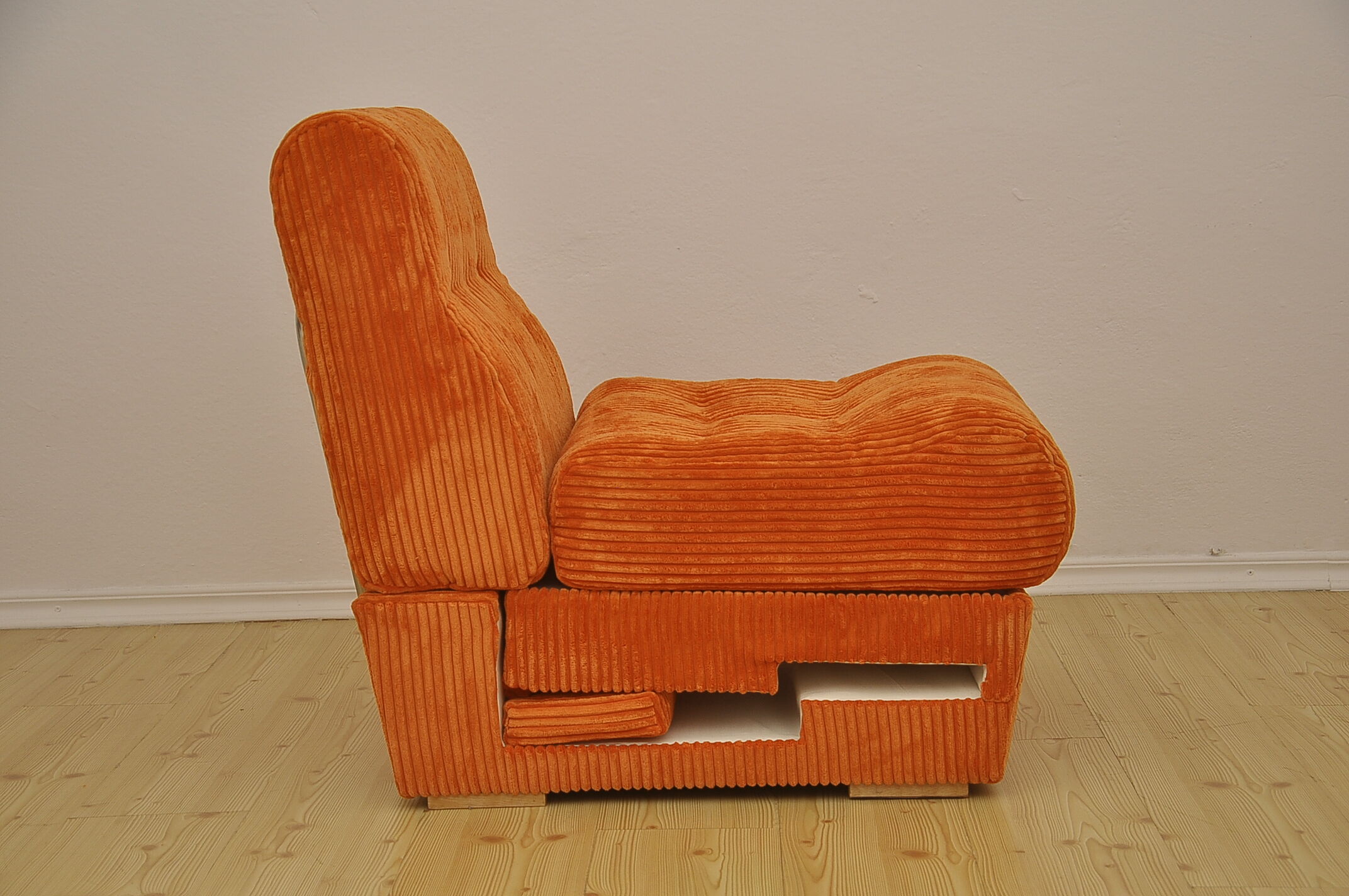 Orange corduroy modular sofa, 1970s.