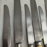 Set of 24 horn table knives