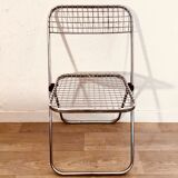 4 chrome folding chairs by Talin Cornedo