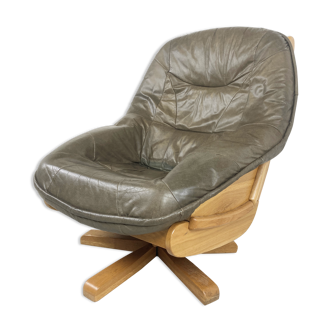 Brutalist oak and leather swivel chair, 1970s