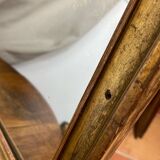 Antique mirror in gilded wood