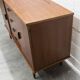 1960s teak sideboard with 4 drawers, 2 doors, and a mirror.
