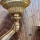 Paire d’appliques murales bronze bras tendus mains