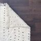 Berber rug with black dots